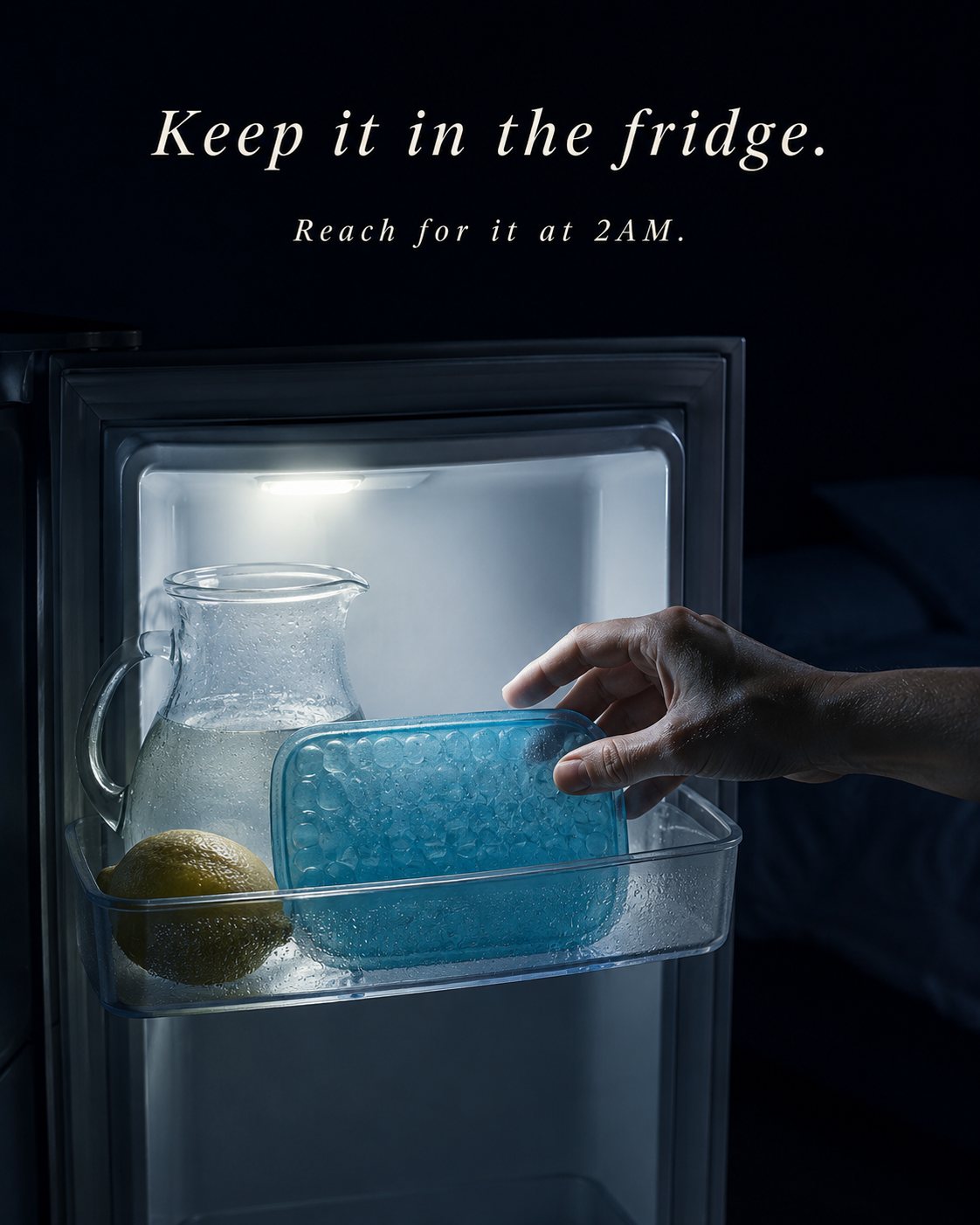 Hand reaching into a fridge in the dark to retrieve the teal gel insert. Keep it in the fridge. Reach for it at 2AM.